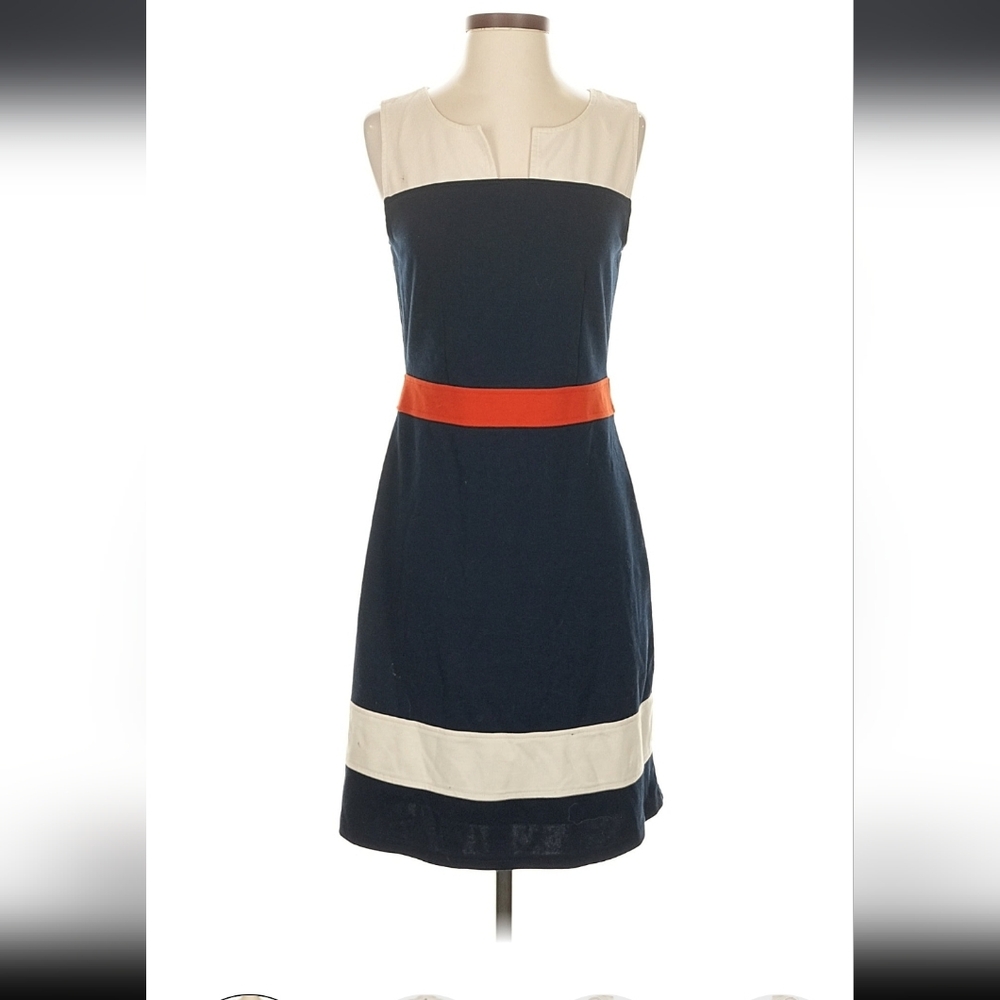 Elegant Navy and Cream Dress with Orange Accent